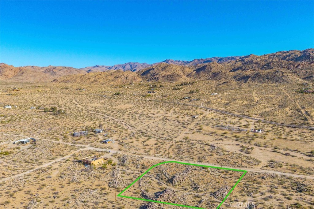 62570 Turtle Road Joshua Tree, CA 92252 - Photo 5 of 22 a view of a field with an ocean view