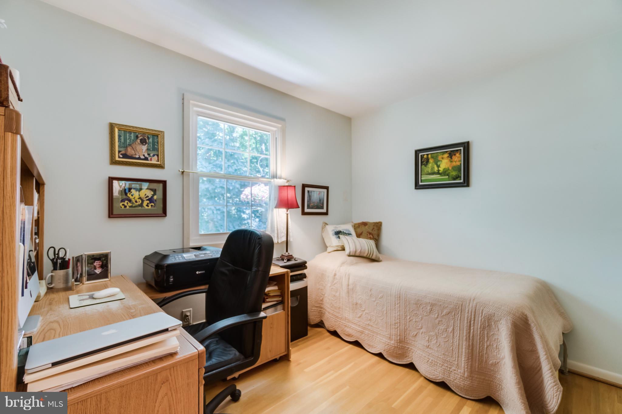 7712 Heming Place Springfield, VA 22151 - Photo 22 of 29 a bedroom with a bed and a desk