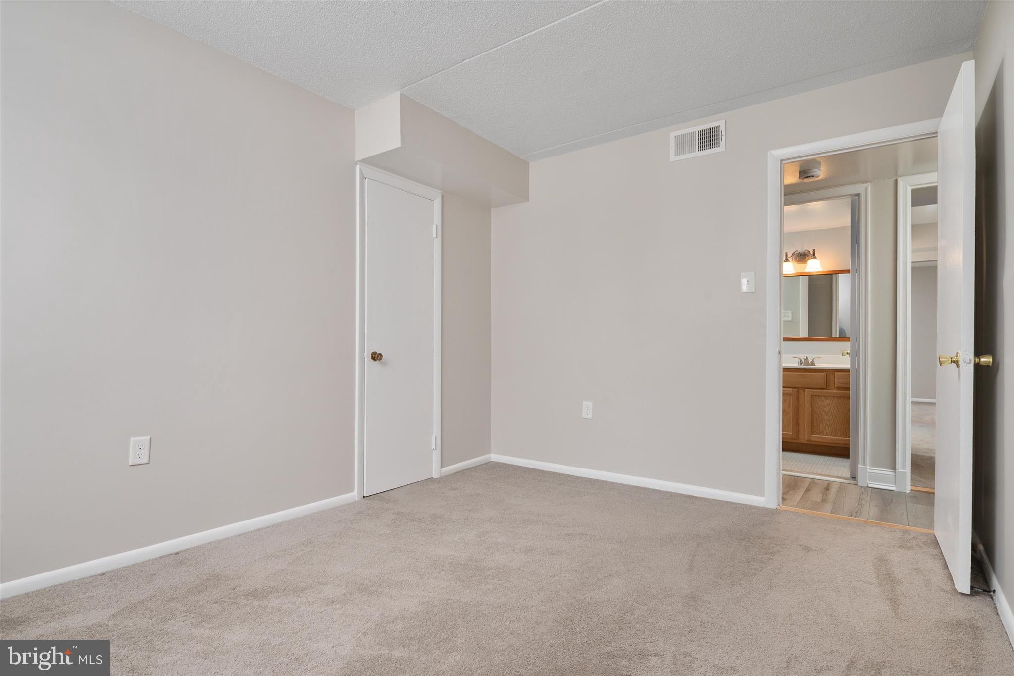 5245 West Running Brook Road, Unit 101 Columbia, MD 21044 - Photo 25 of 33 a view of an empty room