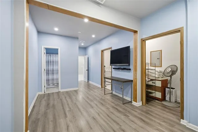 a bathroom with a sink a toilet and a shower