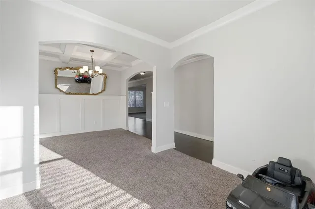 a view of a livingroom with furniture and cabinet