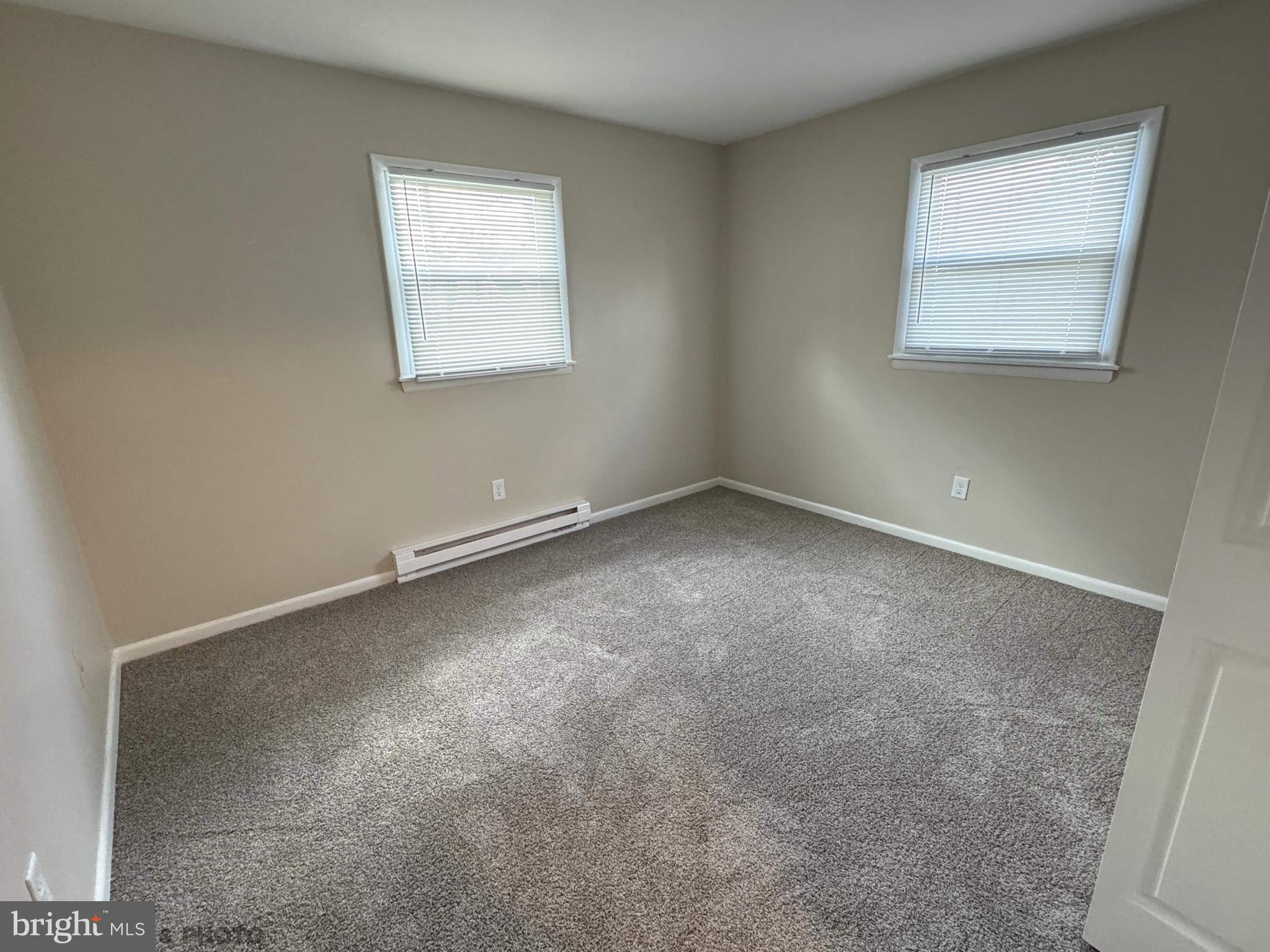 6570 Somerset Street, Unit 2 Harrisburg, PA 17111 - Photo 8 of 9 an empty room with a window