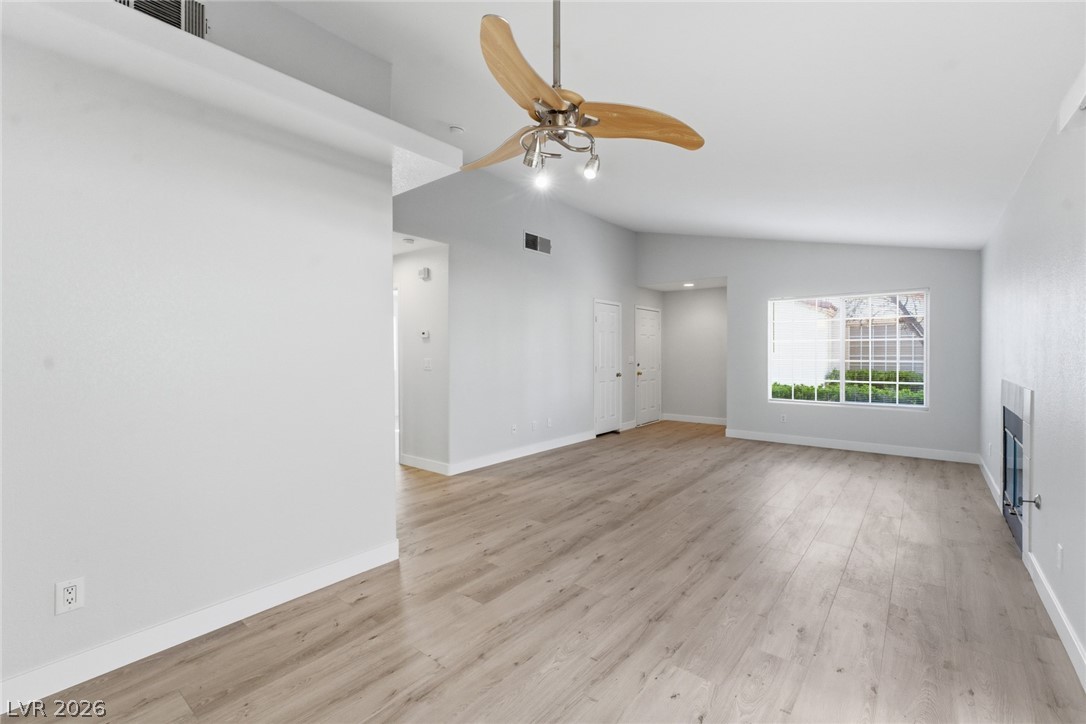 5449 Bugle Way, Unit 104 Las Vegas, NV 89108 - Photo 8 of 33 This airy living space features abundant natural light, creating an inviting atmosphere.