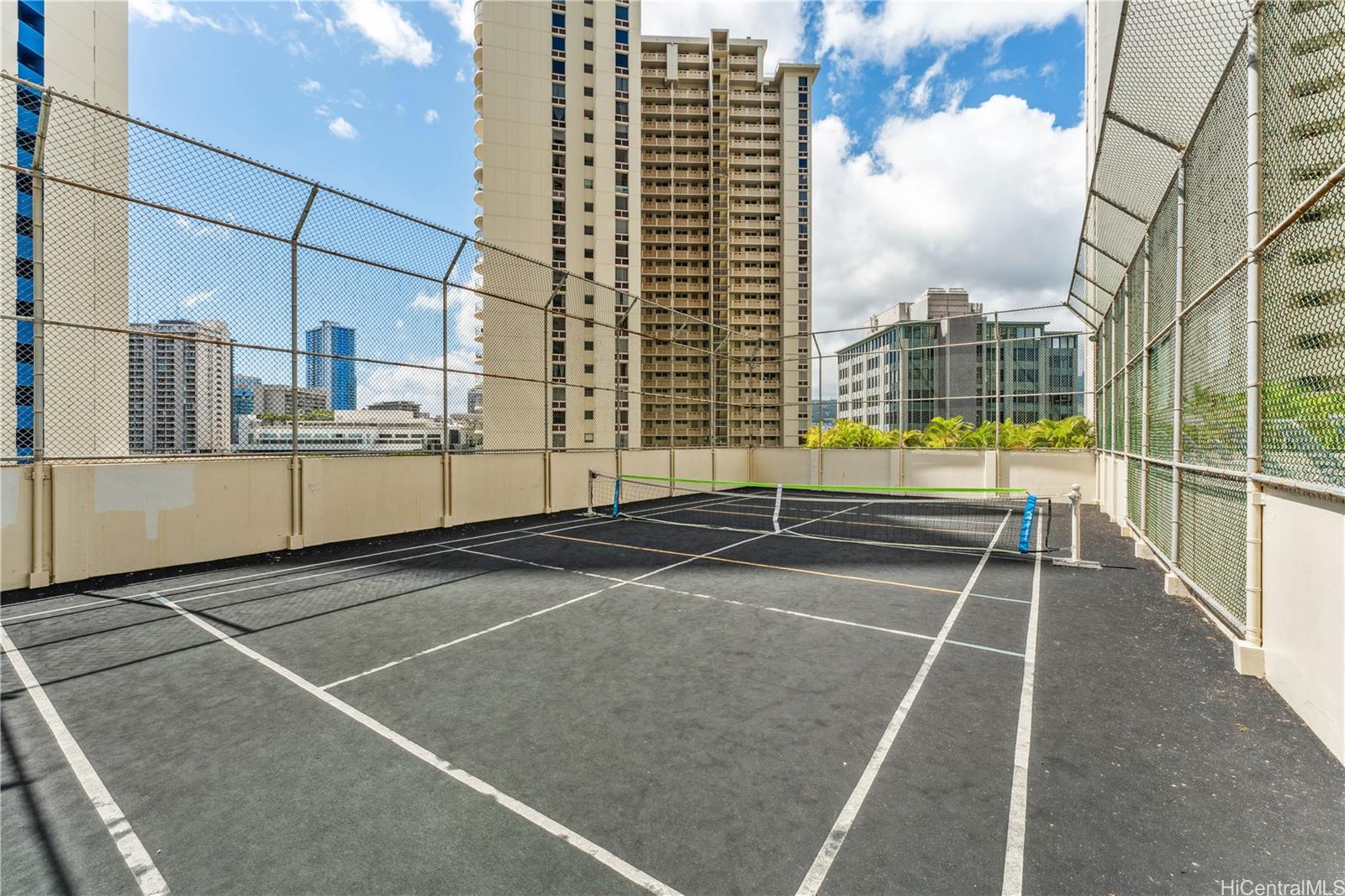 469 Ena Road, Unit 2205 Honolulu, HI 96815 - Photo 18 of 21 a view of a tennis court with basket ball court