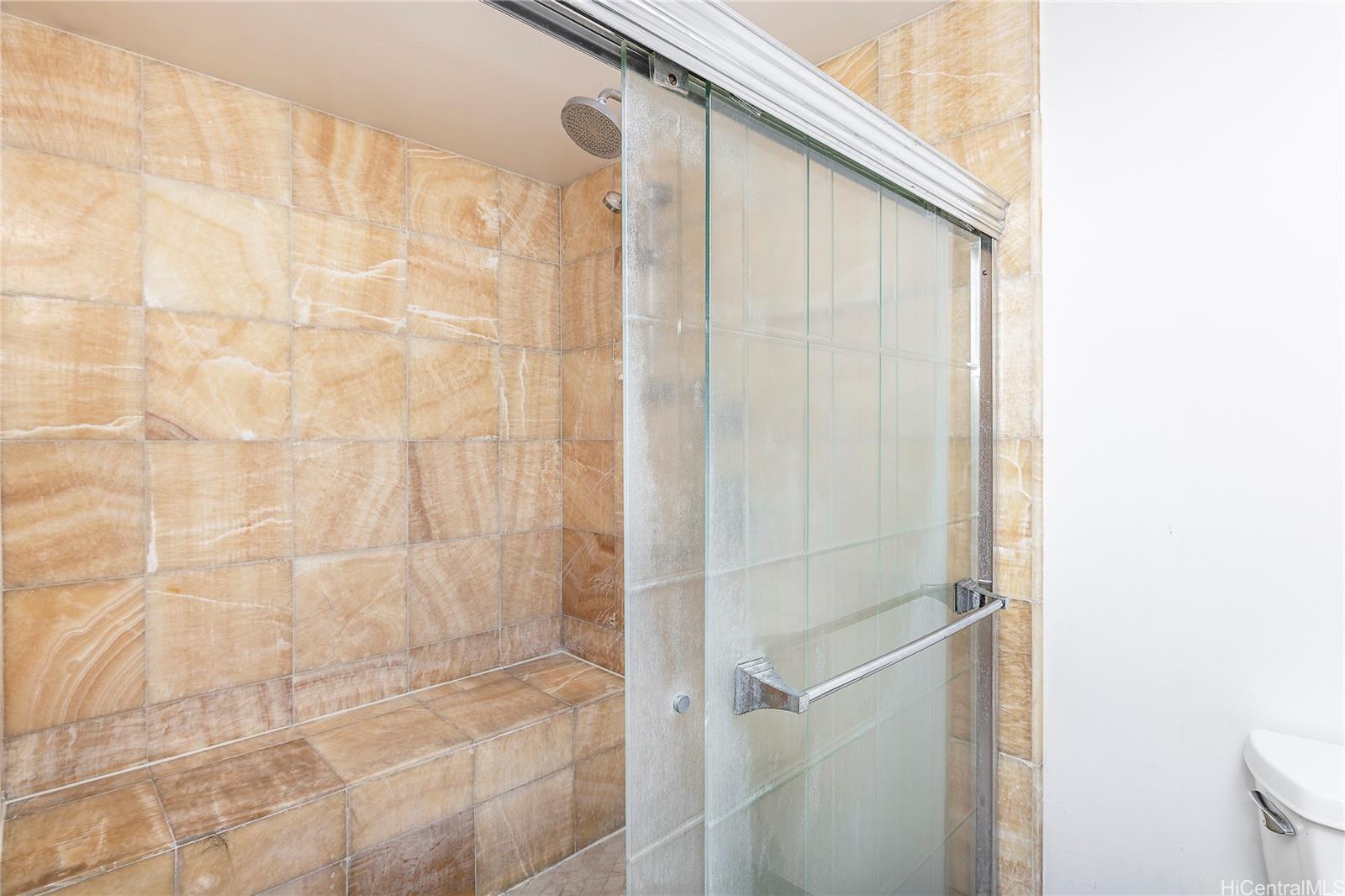 469 Ena Road, Unit 2205 Honolulu, HI 96815 - Photo 7 of 21 a bathroom with a shower