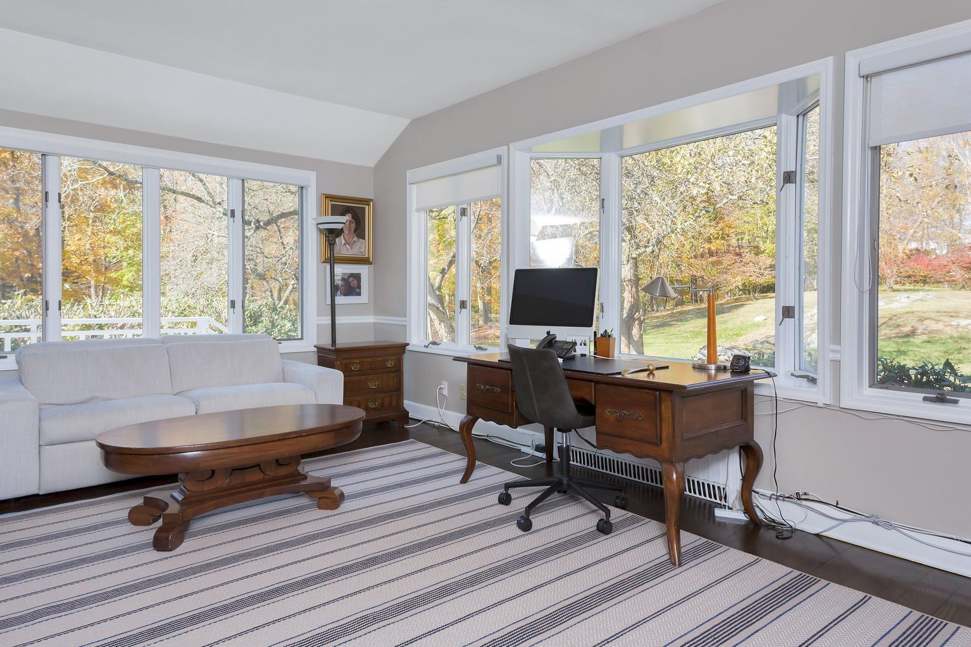 337 Brookside Road Darien, CT 06820 - Photo 14 of 35 a view of a workspace with furniture and a window