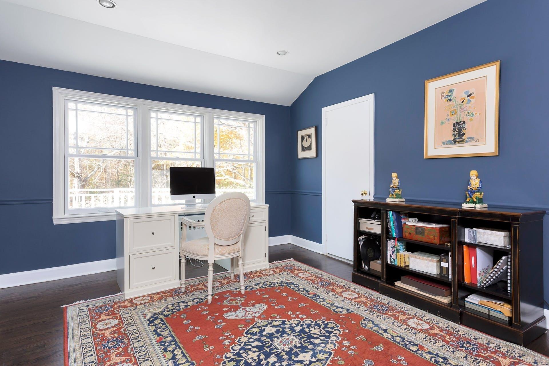 337 Brookside Road Darien, CT 06820 - Photo 19 of 35 a living room with furniture a window and a fireplace