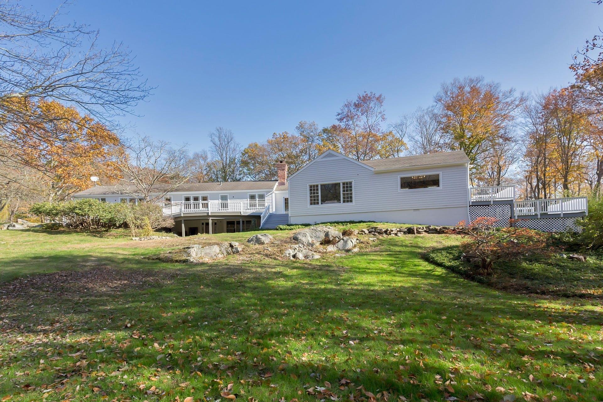 337 Brookside Road Darien, CT 06820 - Photo 30 of 35 a house view with a swimming pool