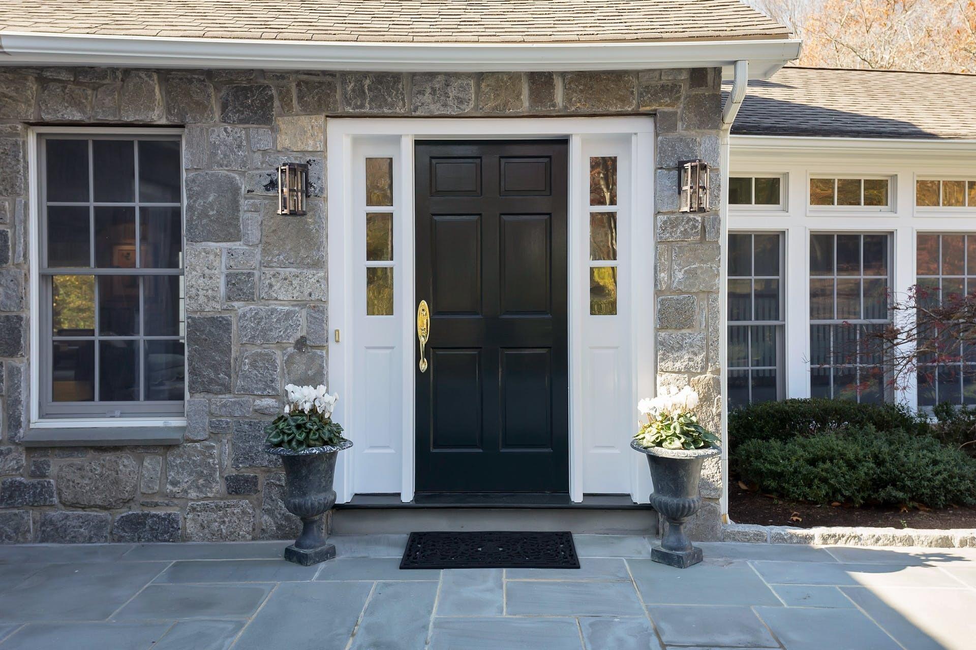 337 Brookside Road Darien, CT 06820 - Photo 3 of 35 a front view of a house with a garden