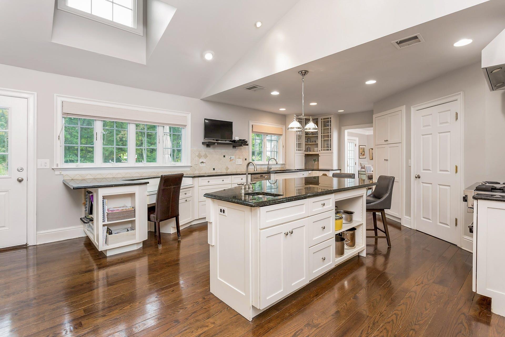 337 Brookside Road Darien, CT 06820 - Photo 7 of 35 a kitchen with a sink a counter top space and appliances