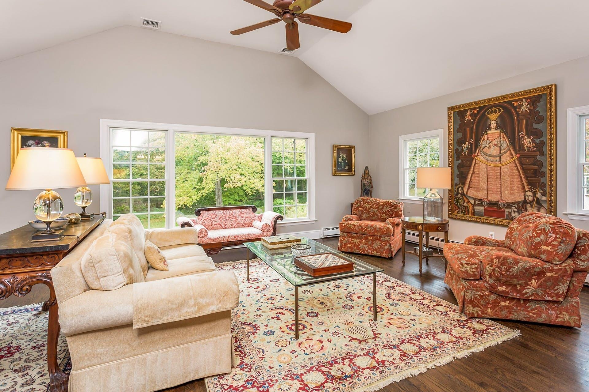337 Brookside Road Darien, CT 06820 - Photo 9 of 35 a living room with furniture and a large window