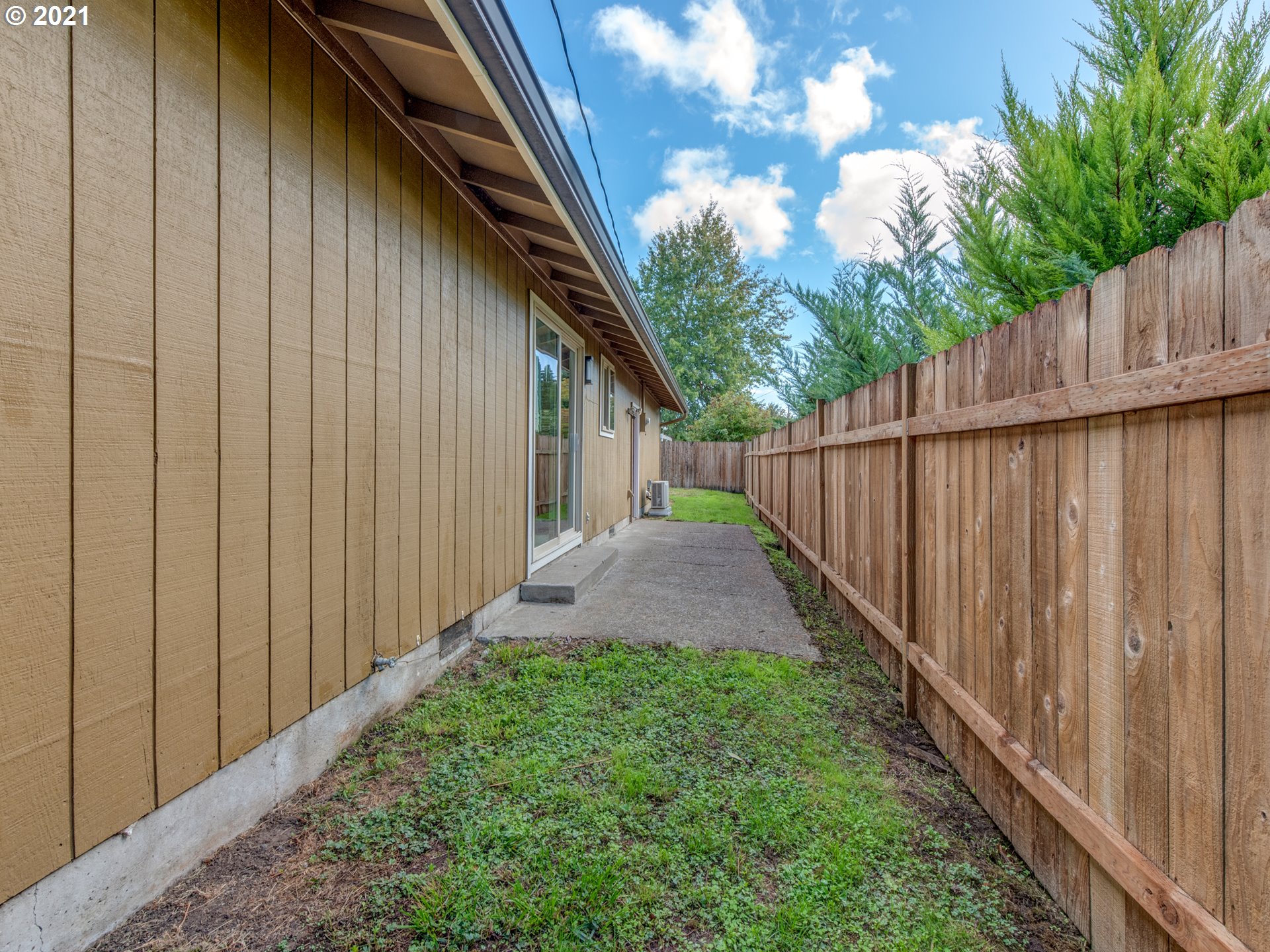 4850 Jessen Drive Eugene, OR 97402 - Photo 21 of 22 a view of a backyard with wooden fence