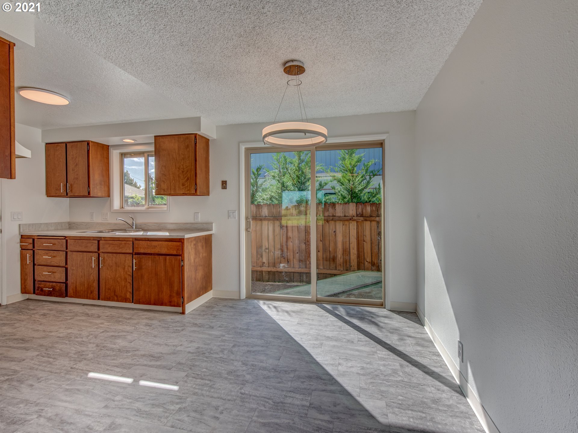 4850 Jessen Drive Eugene, OR 97402 - Photo 8 of 22 a view of a kitchen with a sink and a large window