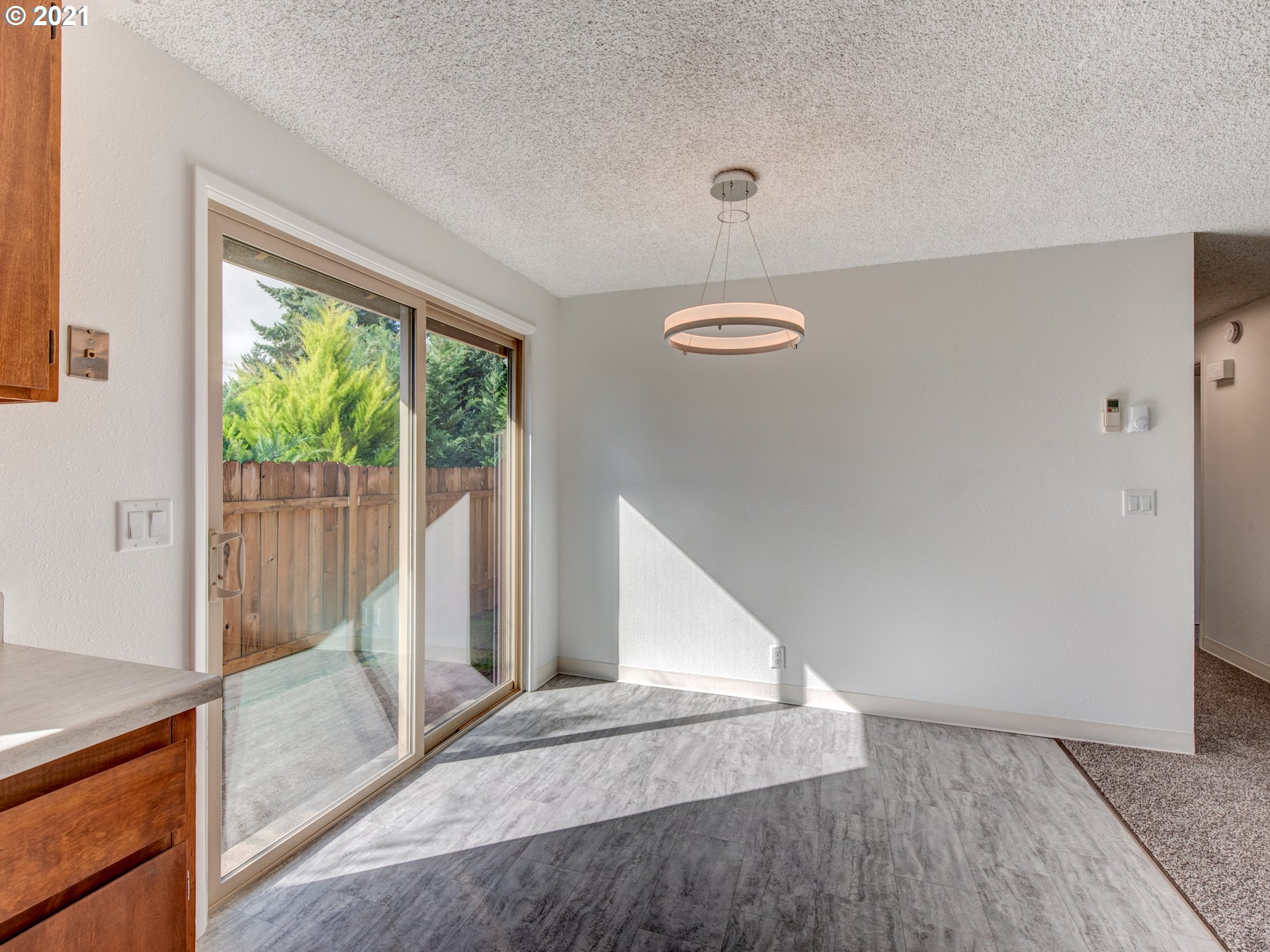 4850 Jessen Drive Eugene, OR 97402 - Photo 10 of 22 a view of entryway with hardwood floor and window