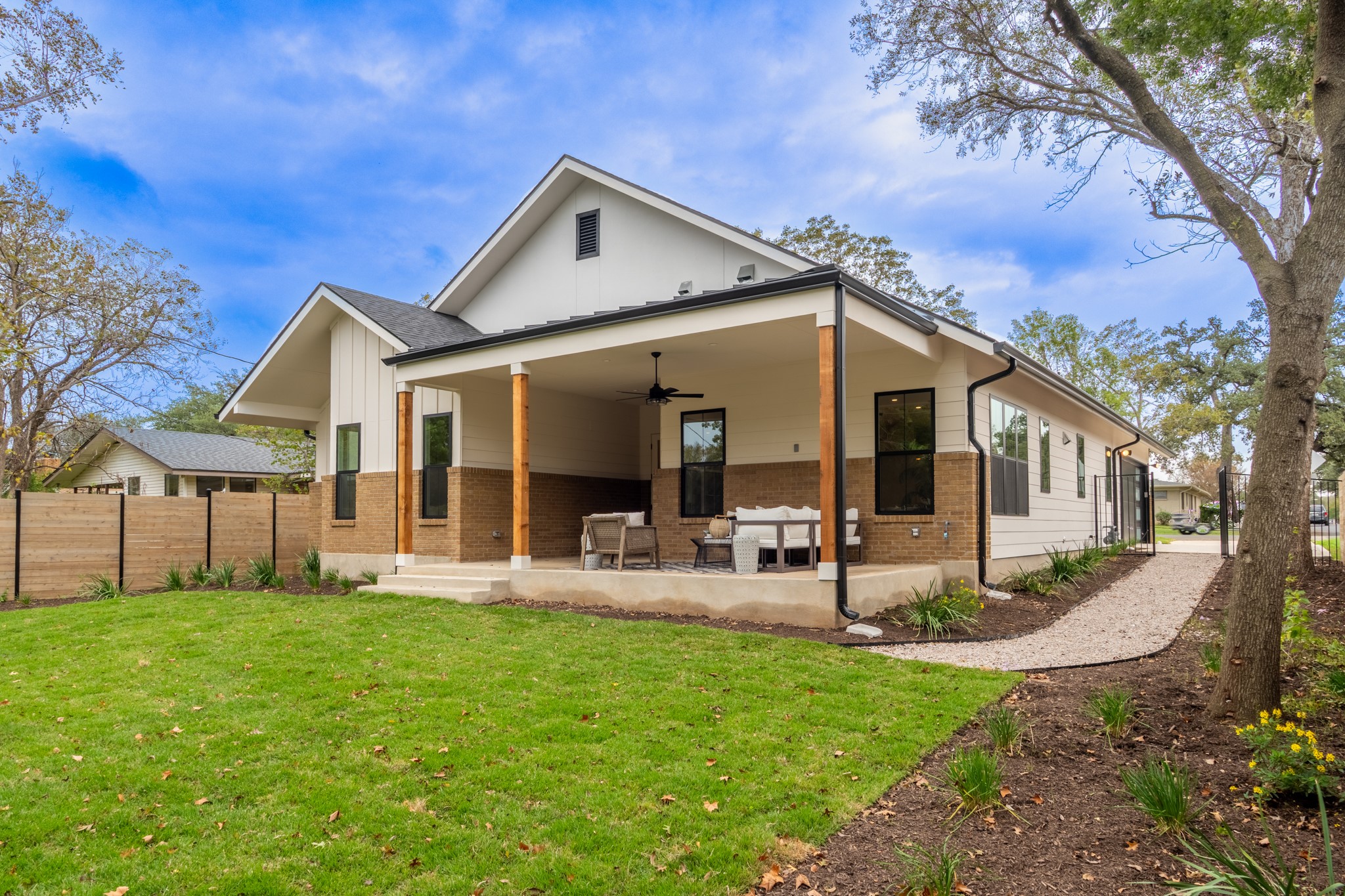 4510 Pack Saddle Pass Austin, TX 78745 - Photo 22 of 26 Beautifully landscaped backyard and spacious covered back patio