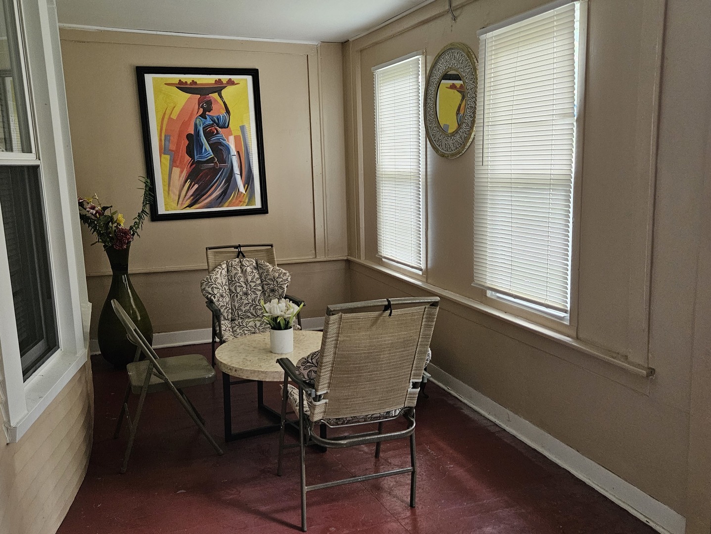 442 West 117th Street Chicago, IL 60628 - Photo 10 of 16 a view of a dining room with furniture and window