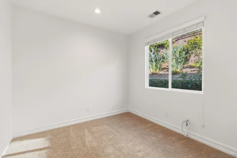 an empty room with a window