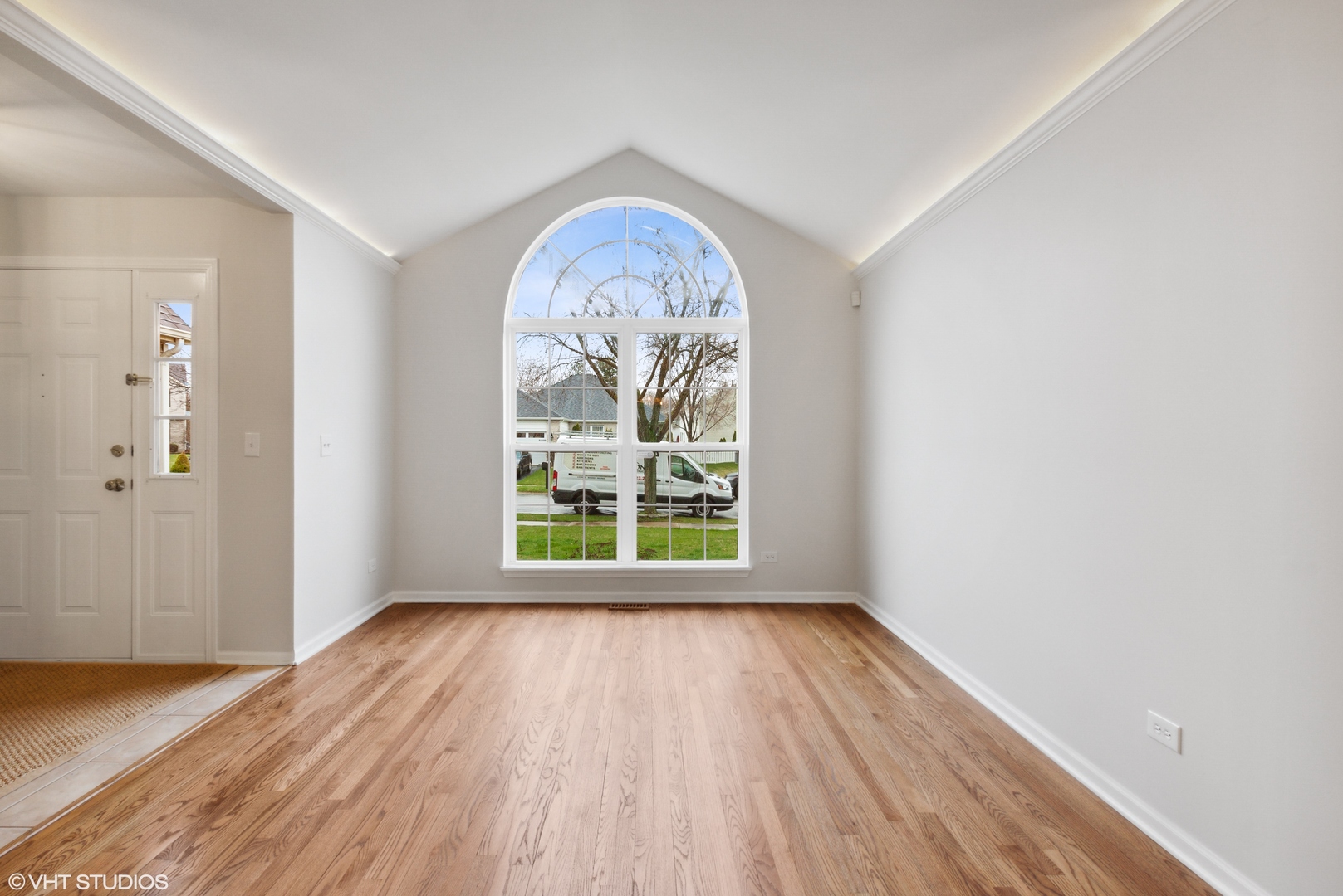 1846 Brookstone Court Romeoville, IL 60446 - Photo 4 of 27 an empty room with wooden floor windows and outdoor space