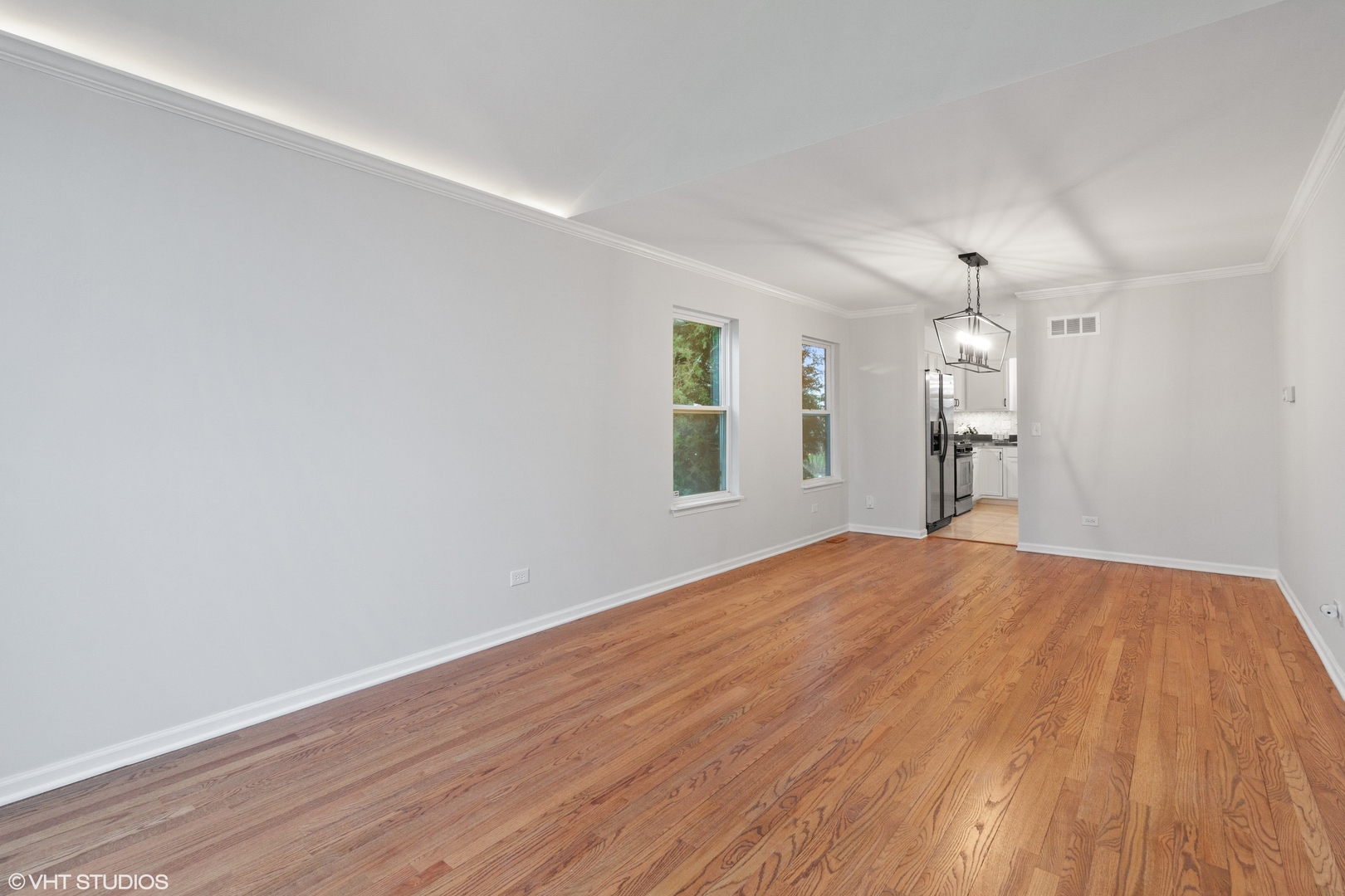 1846 Brookstone Court Romeoville, IL 60446 - Photo 5 of 27 a view of empty room with wooden floor and window