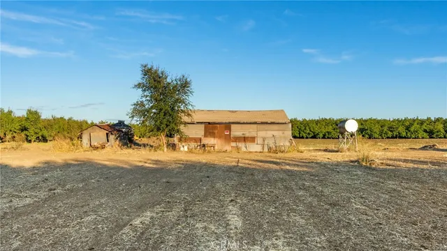a view of a yard with an ocean