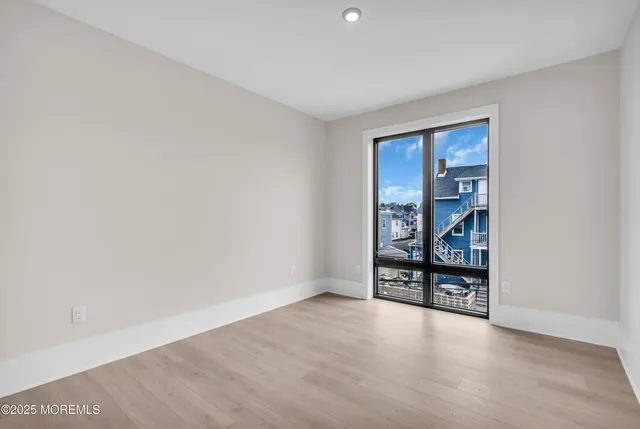 an empty room with bookshelf