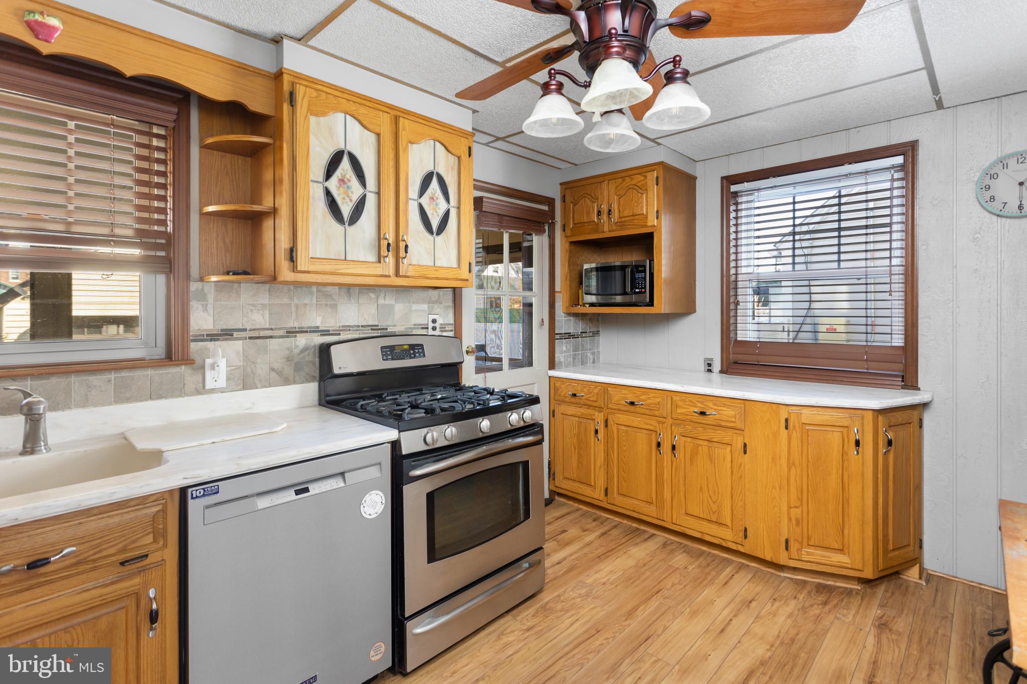 6 7th Avenue Roebling, NJ 08554 - Photo 12 of 42 a kitchen with stainless steel appliances granite countertop a stove a sink and a microwave