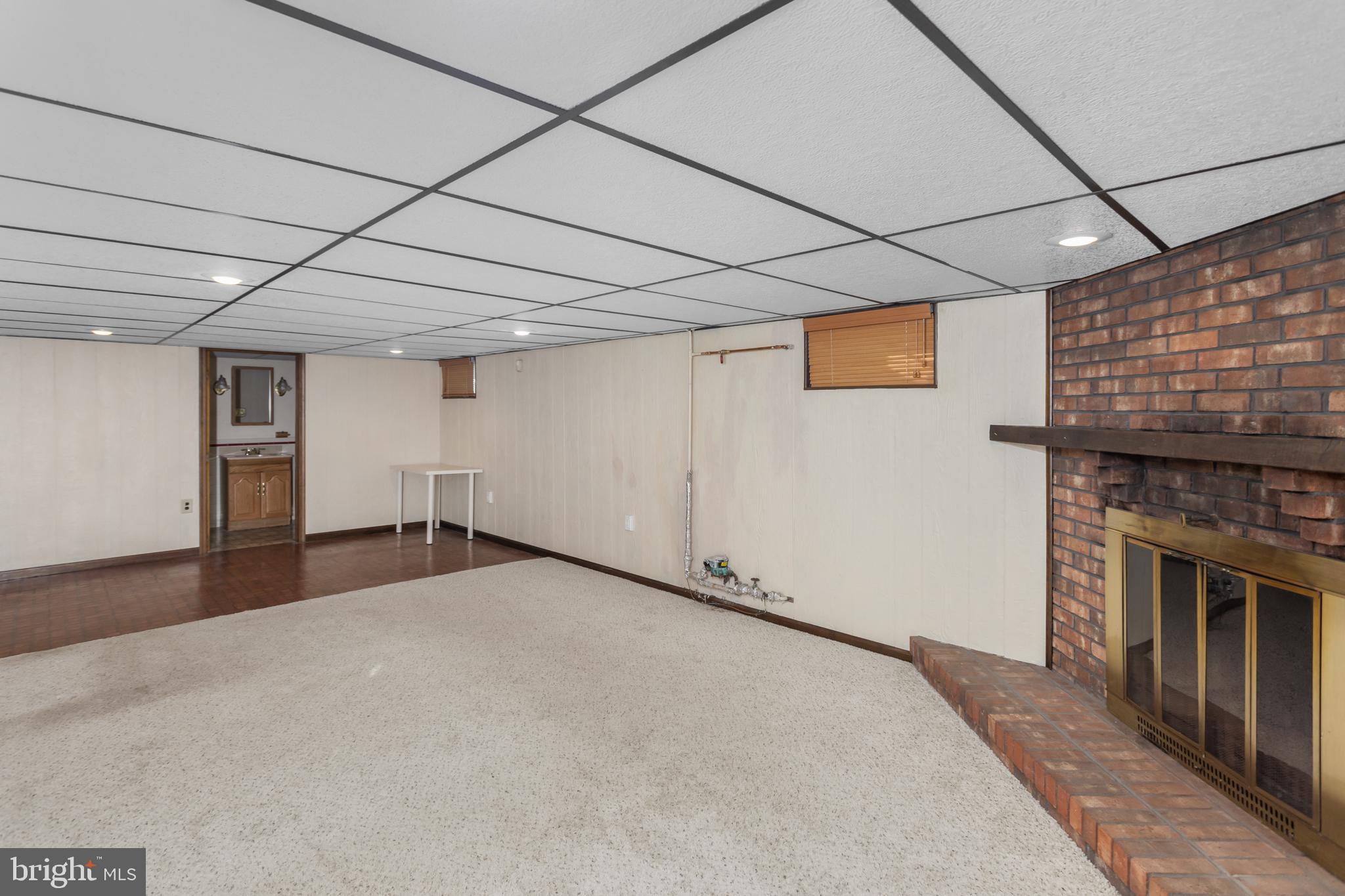 6 7th Avenue Roebling, NJ 08554 - Photo 24 of 42 a view of a livingroom with an empty space and a fireplace