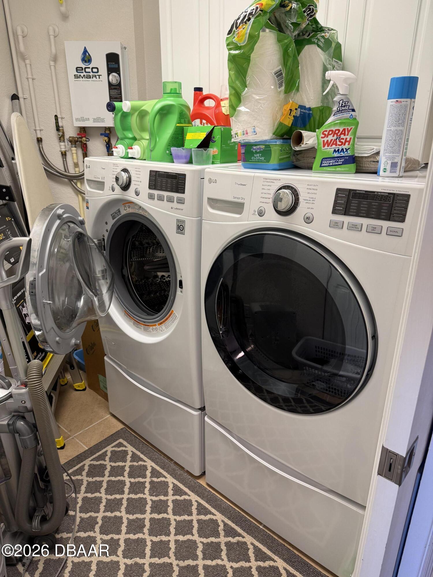 2801 South Ridgewood Avenue, Unit 409 South Daytona, FL 32119 - Photo 23 of 23 a utility room with dryer and washer
