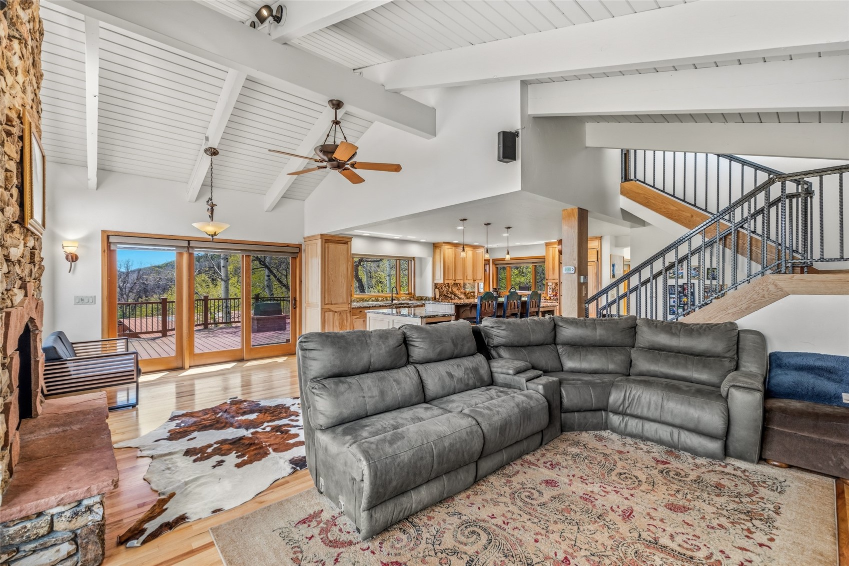 31775 Bradley Ranch Steamboat Springs, CO 80487 - Photo 42 of 49 a living room with furniture ceiling fan and a rug