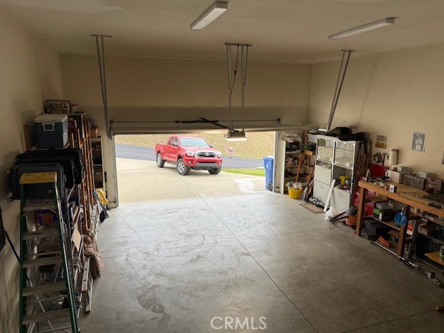 18992 Redbud Road Hidden Valley Lake, CA 95467 - Photo 26 of 39 a view of a storage room with a lot of stuff