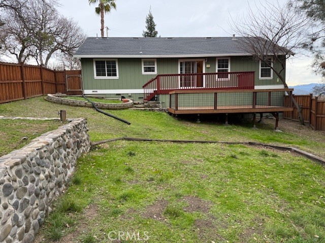 18992 Redbud Road Hidden Valley Lake, CA 95467 - Photo 29 of 39 a front view of a house with garden