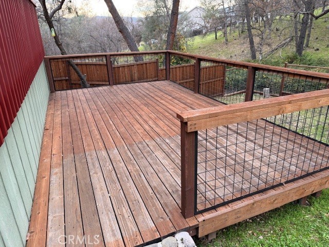18992 Redbud Road Hidden Valley Lake, CA 95467 - Photo 34 of 39 a view of balcony with wooden floor and fence