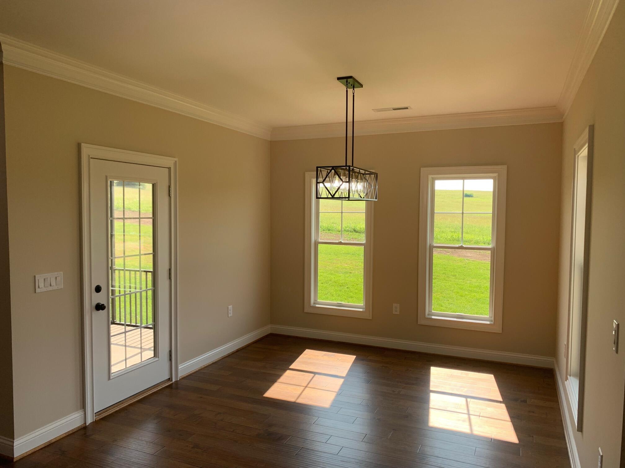 112 Retreat Road Danville, KY 40422 - Photo 8 of 40 112 Retreat eating area and door to scre