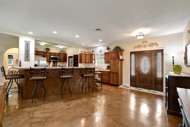 a view of a dining area with furniture window and wooden floor