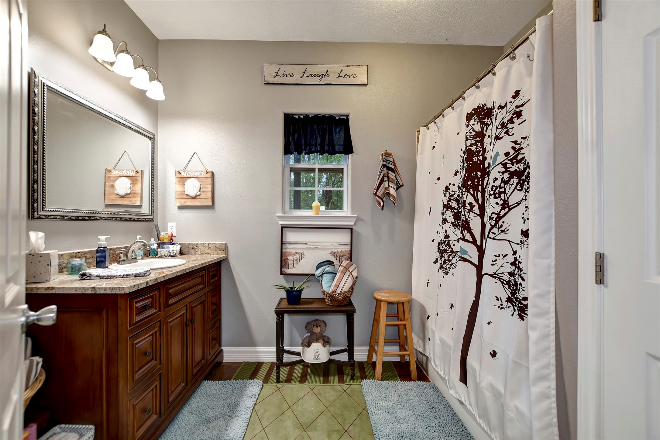 28030 Highway 6 Hempstead, TX 77445 - Photo 31 of 50 a bathroom with a sink and a mirror