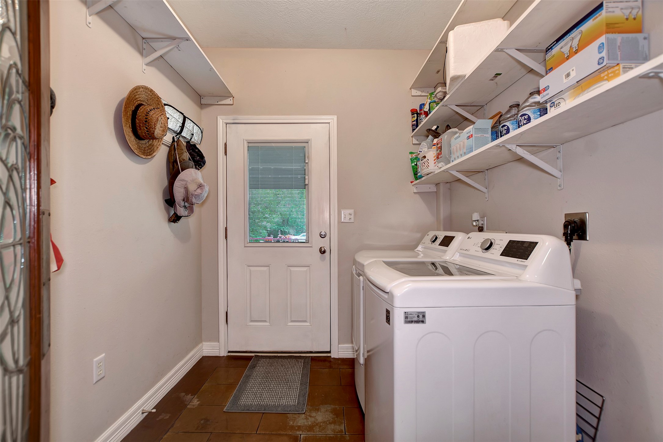 28030 Highway 6 Hempstead, TX 77445 - Photo 32 of 50 a utility room with dryer and washer