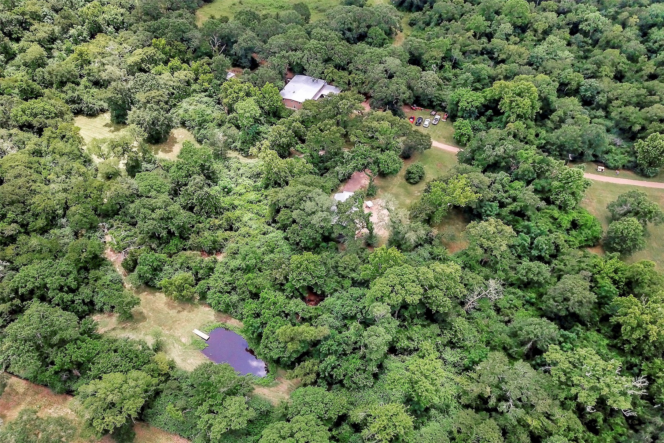 28030 Highway 6 Hempstead, TX 77445 - Photo 45 of 50 an aerial view of a house with a yard