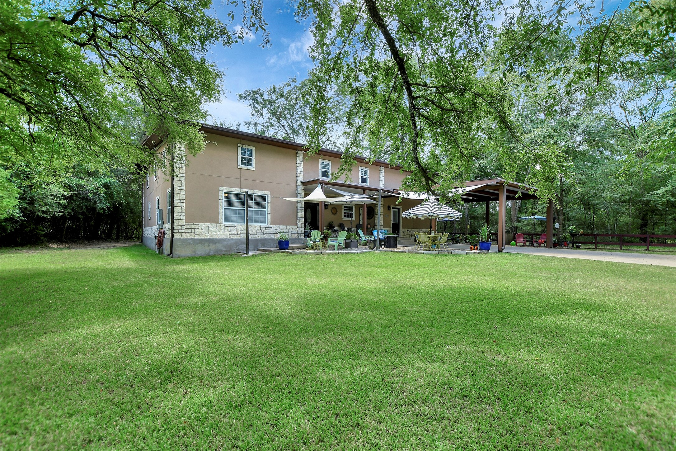 28030 Highway 6 Hempstead, TX 77445 - Photo 5 of 50 a view of a house with backyard and a tree