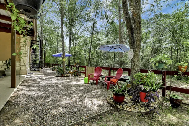 a view of a chairs and tables in the patio