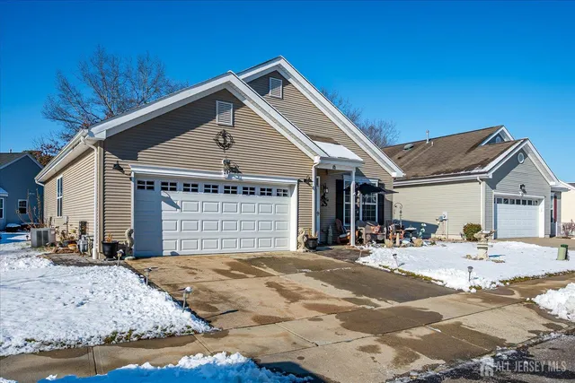 a front view of a house with a outdoor space