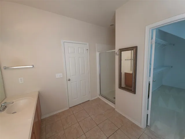 a bathroom with a sink and toilet