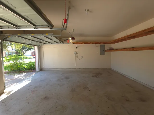 a view of a room with wooden walls