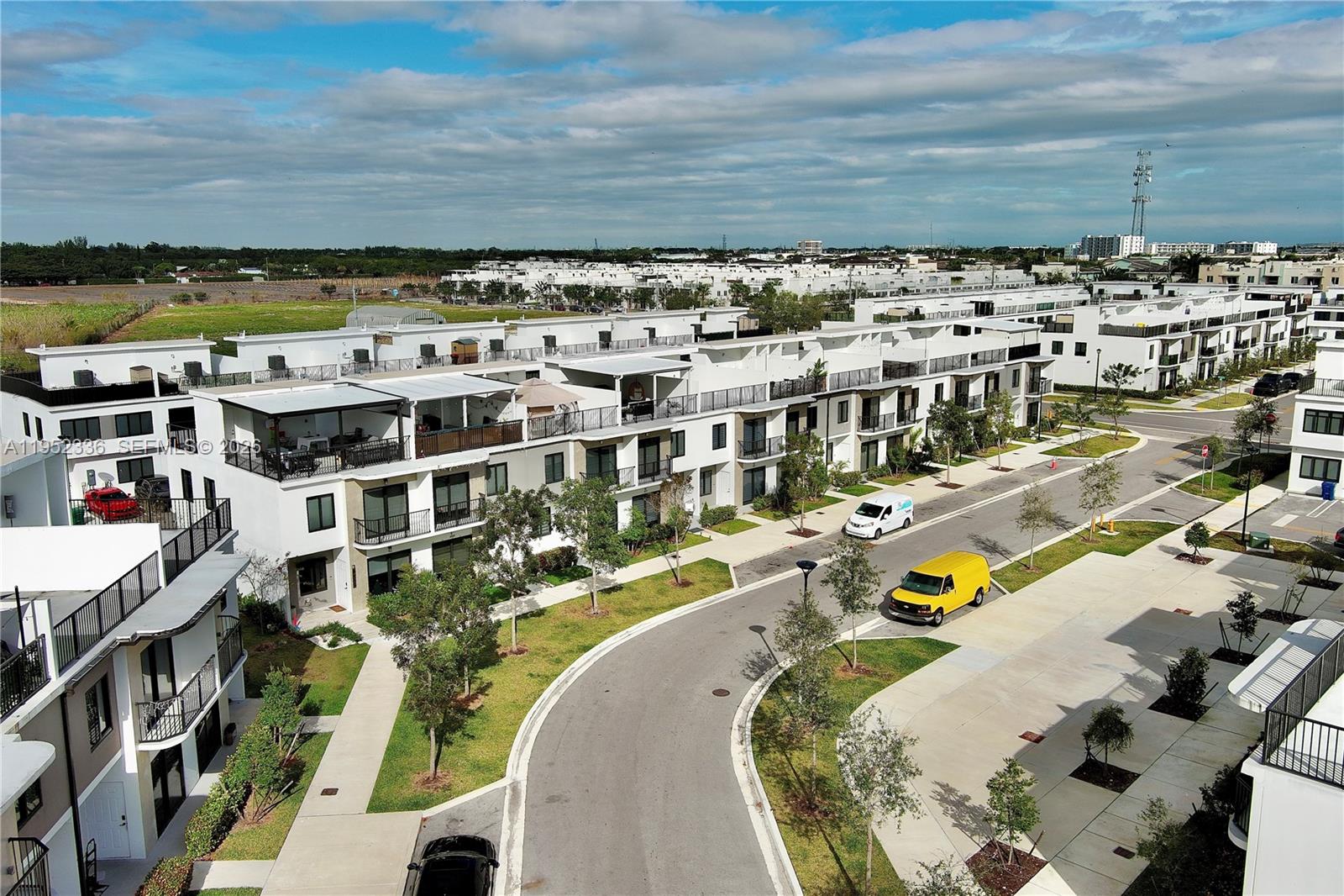 14571 Southwest 261st Street Homestead, FL 33032 - Photo 25 of 30 a view of a swimming pool with a patio