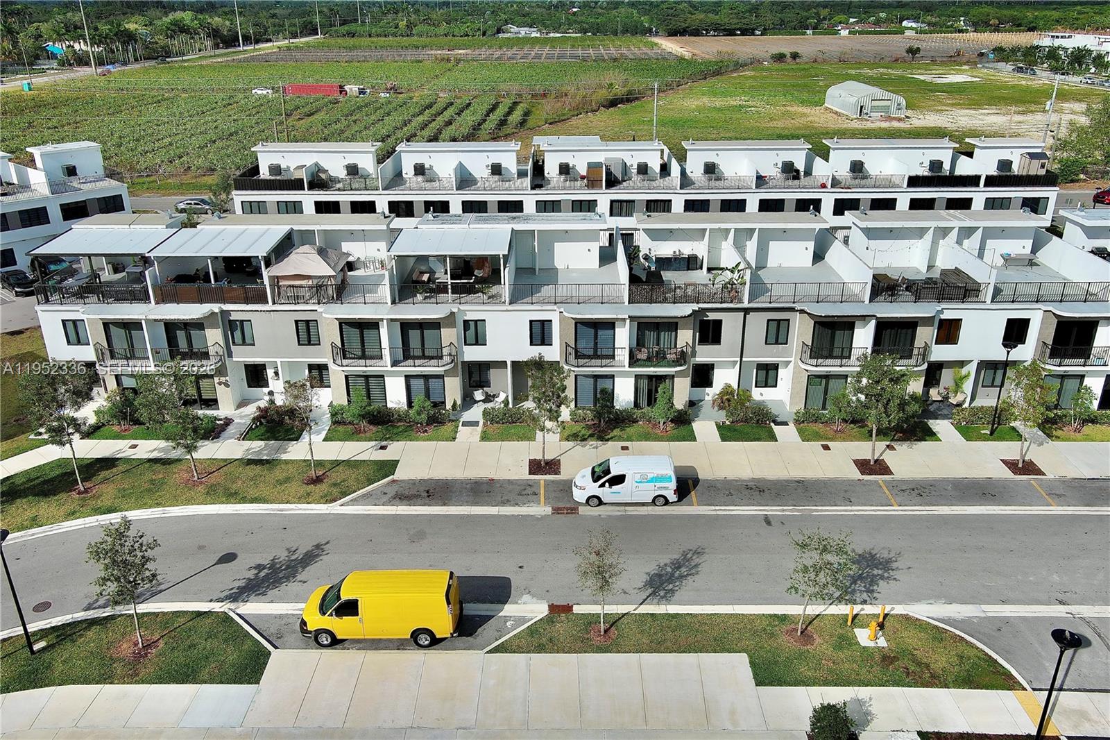 14571 Southwest 261st Street Homestead, FL 33032 - Photo 26 of 30 a view of a swimming pool and a yard