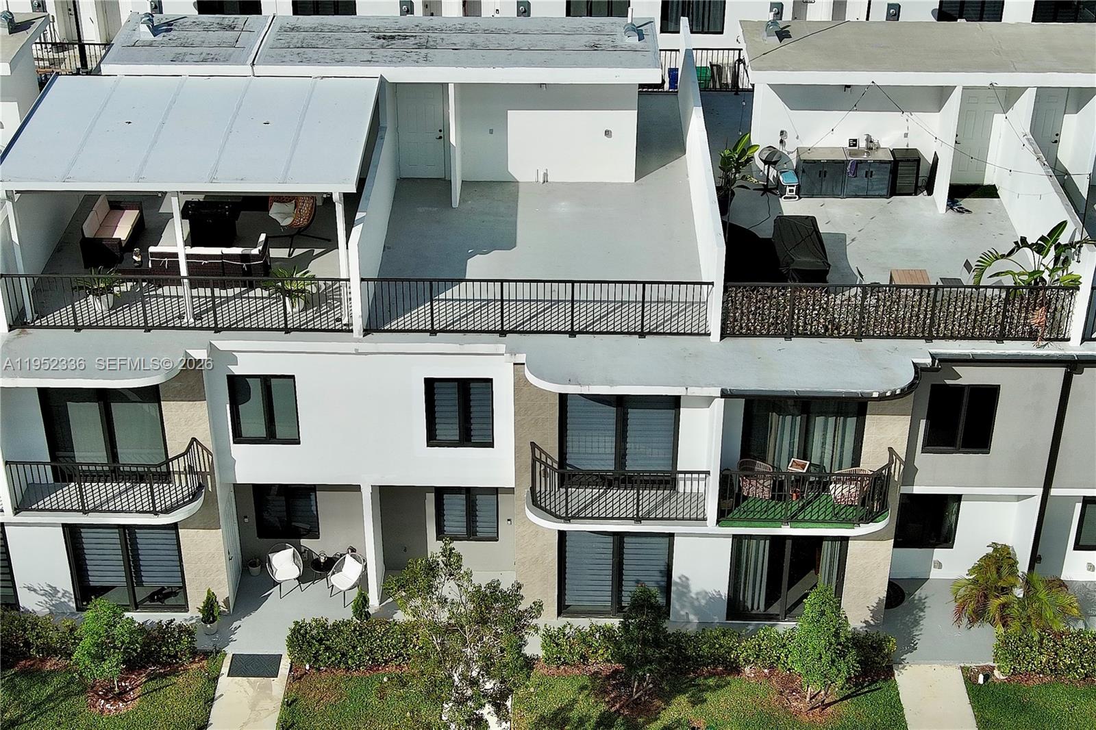 14571 Southwest 261st Street Homestead, FL 33032 - Photo 7 of 30 a aerial view of a multi story building