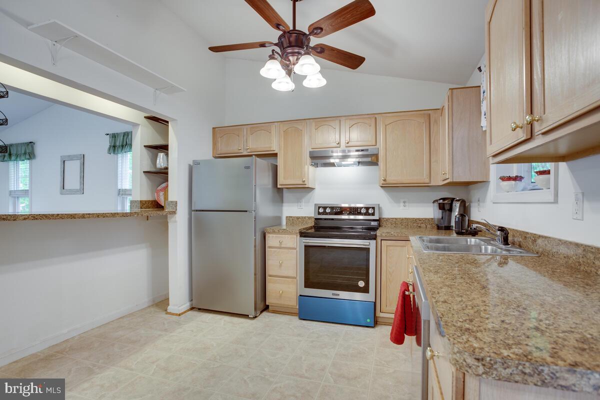 427 Buffalo Road Lusby, MD 20657 - Photo 12 of 47 Pass Through Window and Breakfast Bar Seating