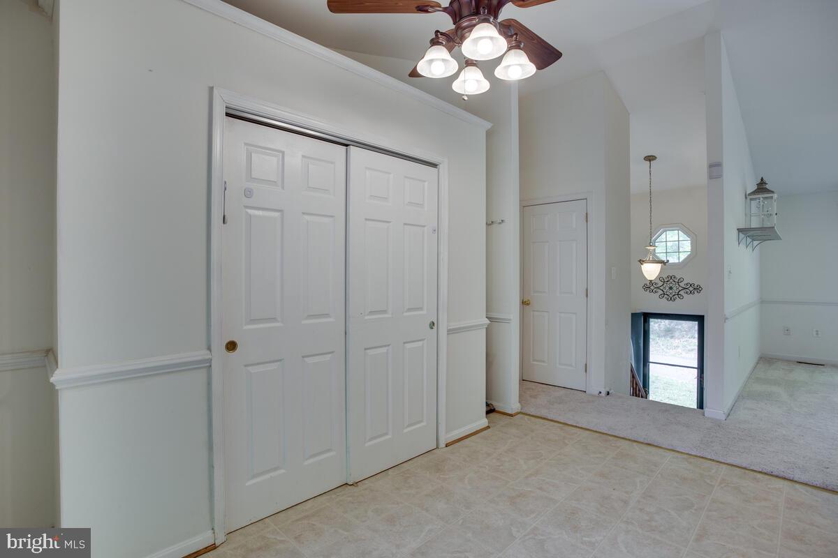 427 Buffalo Road Lusby, MD 20657 - Photo 16 of 47 HUGE Pantry With Lots of Storage and Shelving!