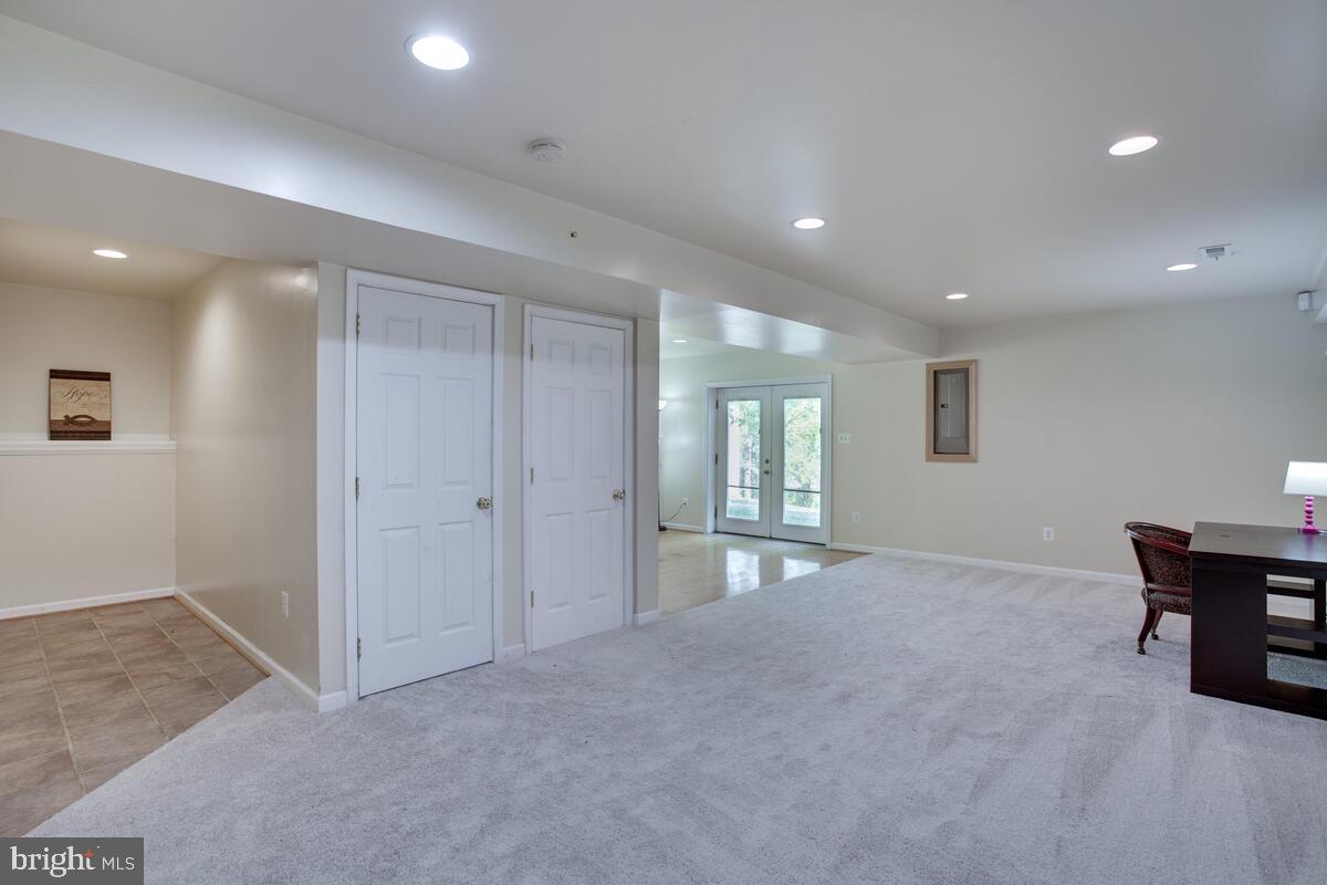 427 Buffalo Road Lusby, MD 20657 - Photo 34 of 47 Lower Level Walk Out Level with Storage