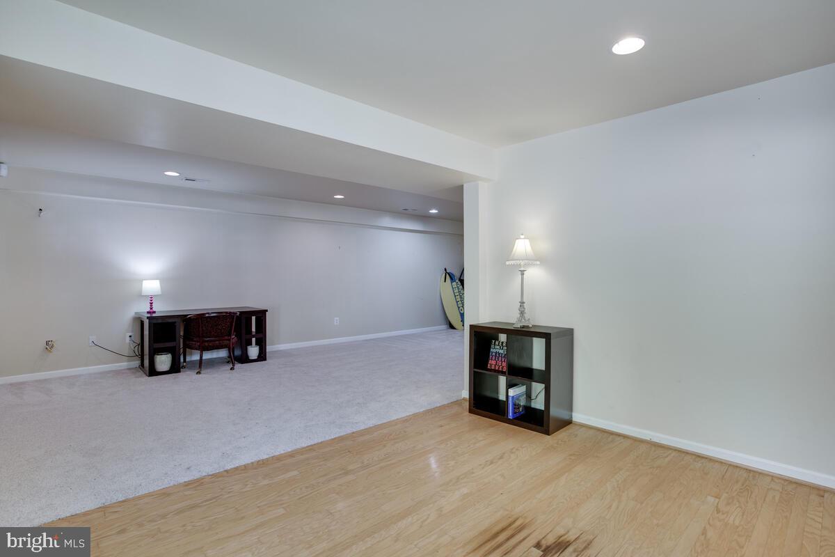 427 Buffalo Road Lusby, MD 20657 - Photo 35 of 47 Entry from Lower Level is Hardwood
