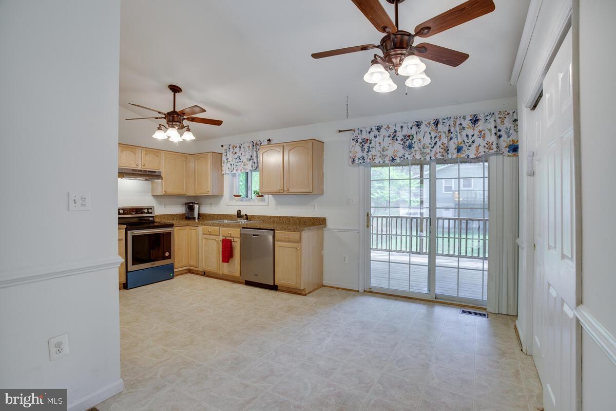 427 Buffalo Road Lusby, MD 20657 - Photo 9 of 47 Large, Open Kitchen and Dining Area